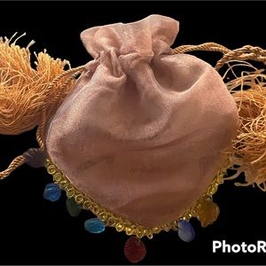 Jewelry pouch with beads on it